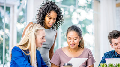 Colleagues Reviewing A Document 