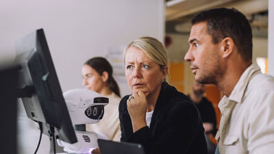 Colleagues Reviewing Solution With Ai 