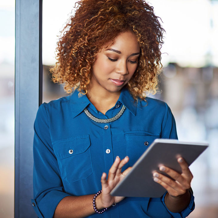 Woman Working On Ipad 