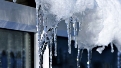 Frozen Water On House Exterior 
