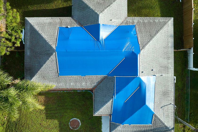 Areial Photo Of Roof Damaged Home 