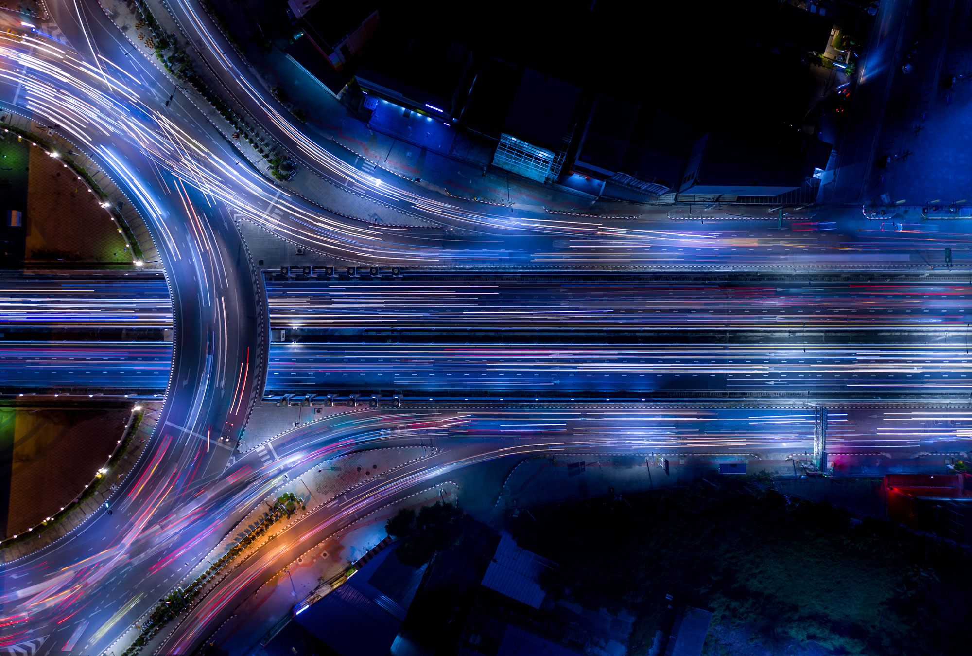 Aerial Time Lapse Photo Of Cars Driving At Night 