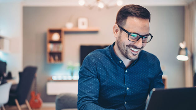 Man Working On Laptop 