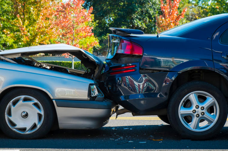 silver-car-black-car-crash-rear-end
