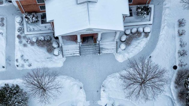 Overview House Driveway Covered In Snow 