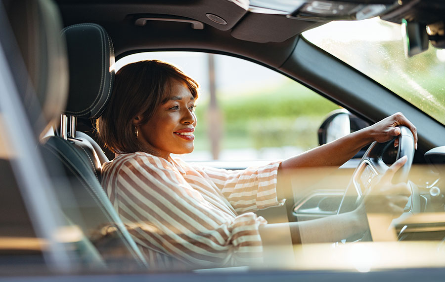 SmilingWomanDrivingCar