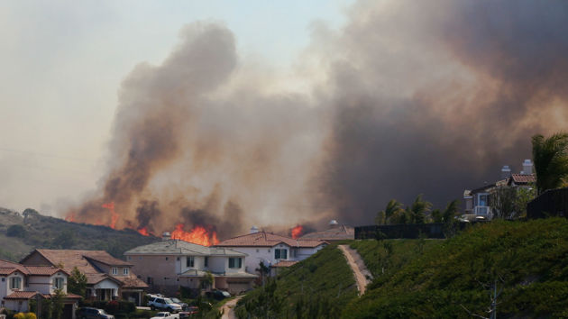 Wildfire And Smoke Behind Neighborhood Homes 