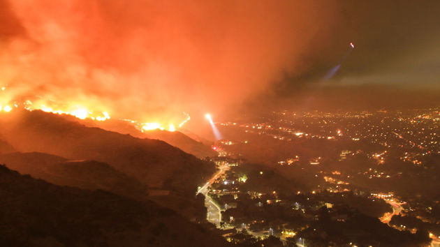 Hillside Neighborhood With Approaching Wildfires 