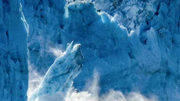 Iceberg Melting Into Water 