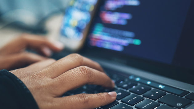 Hands Typing On A Keyboard 