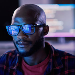 Man Looking At Computer Monitor 