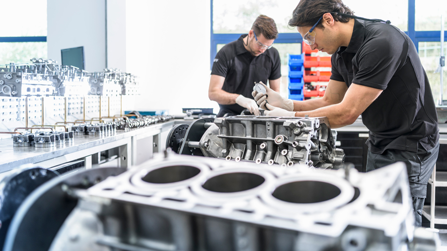 mechanics-working-on-engines